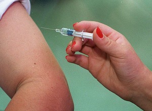 Niño siendo vacunado contra la Gripe A H1N1